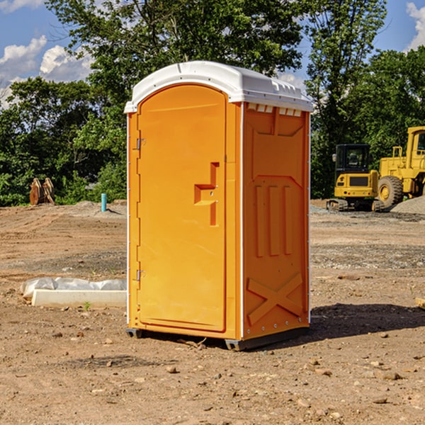 what is the cost difference between standard and deluxe porta potty rentals in New Goshen Indiana